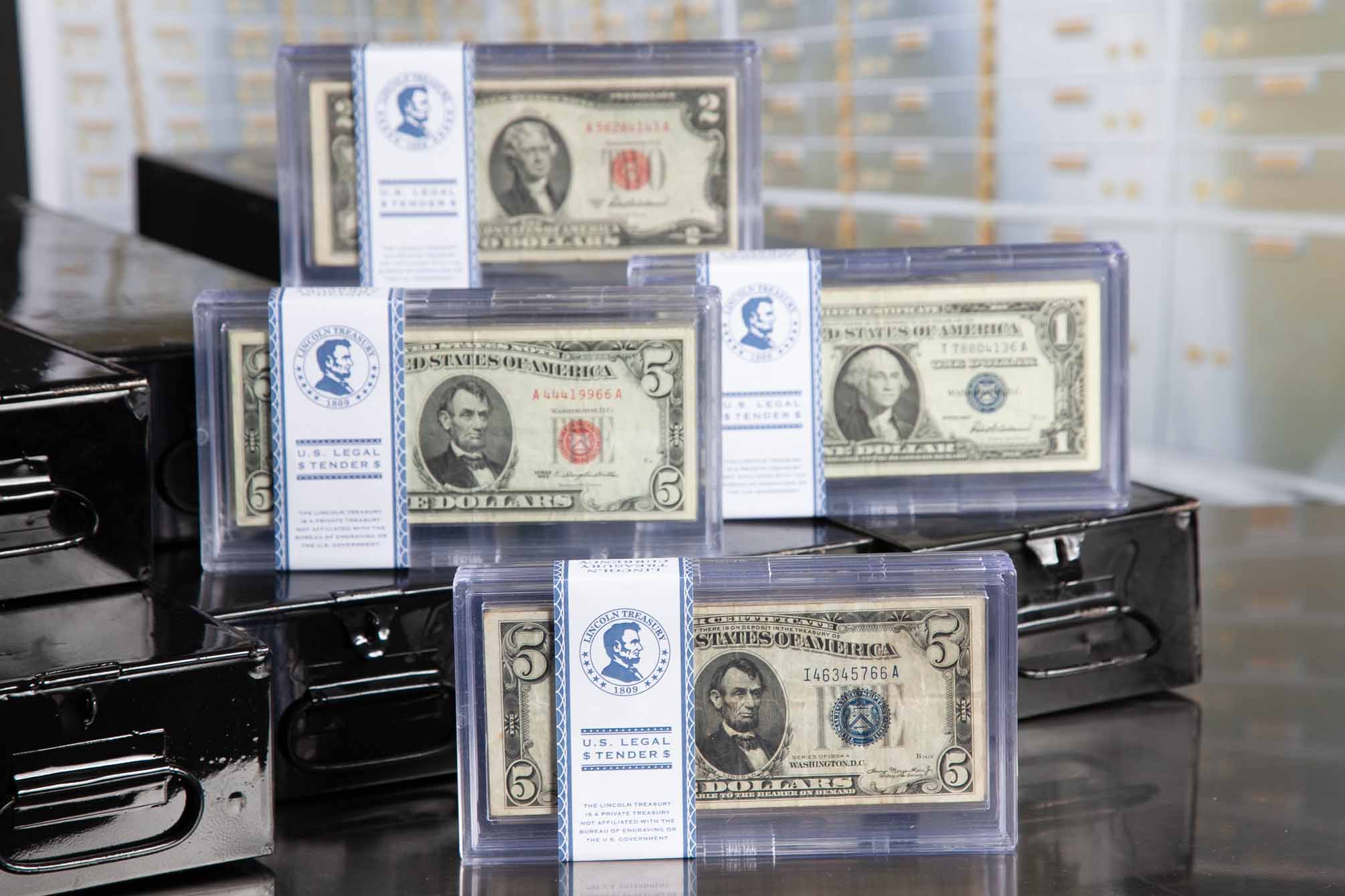Multiple Sets of Blue and Red Seal Collections, "U.S. Legal Tender" - Lincoln Treasury, Sitting on metal vault boxes
