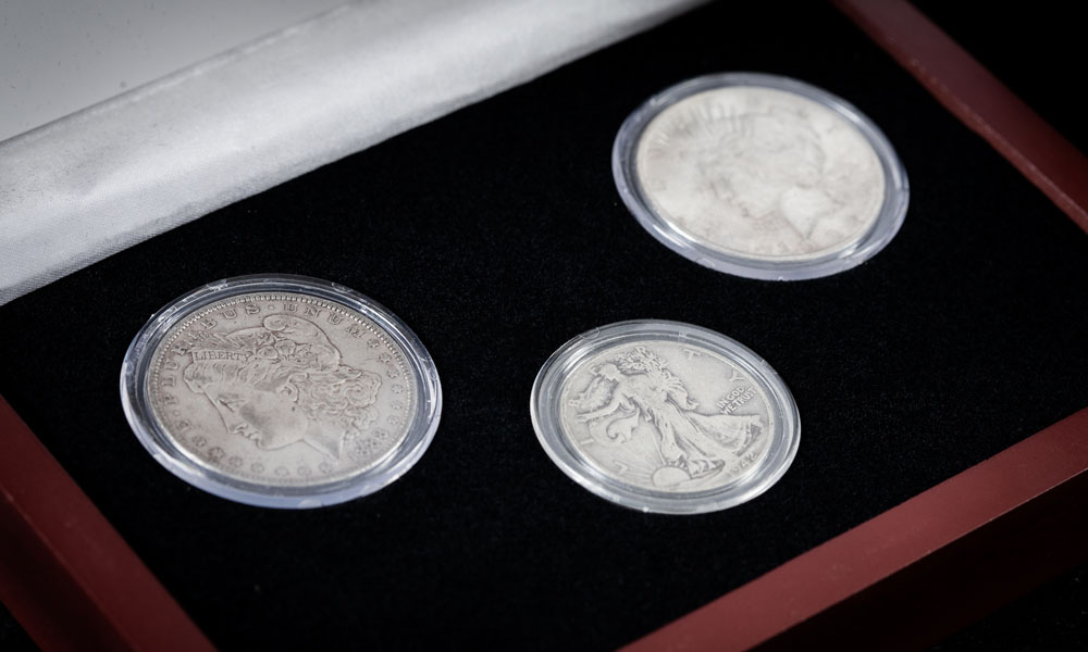 America's Greatest Silver Dollars Set in a wooden display case - Close-Up