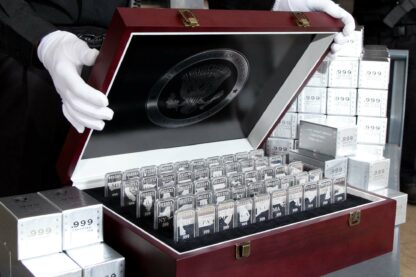 Wooden Display Chest with All 50-States Silver Bars, One of Each State, .999 Fine Silver, Left View with White-Gloved Hands Holding Chest Lid